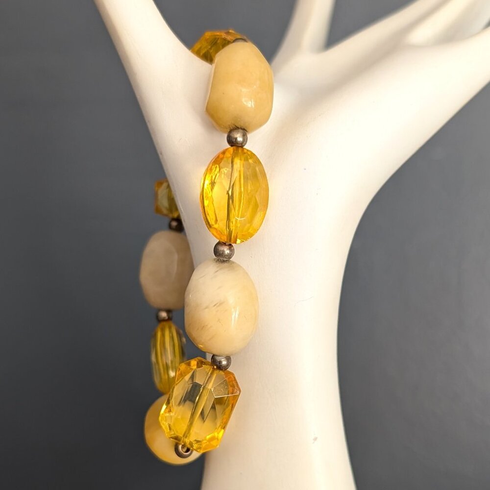 Cream stone and orange yellow glass beaded stretch bracelet